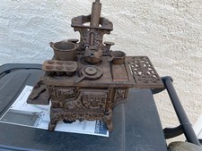 jouet ancien cuisinier en fonte tres belle facture