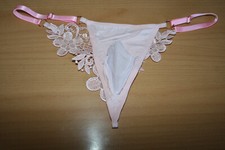 string homme sexy couleur rose dentelle sur l'arriere et reglable sur les cotes 