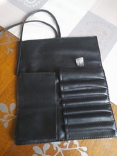 Pochette noire de rangement pour pinceaux de maquillage