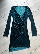 Robe moulante Taille correspond à du M bleu vert turquoise