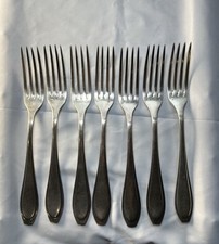 7 fourchettes métal argenté