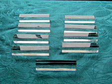 9 portes couteaux en cristal de Baccarat signé