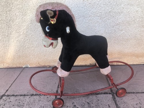 Cheval bascule peluche - à,