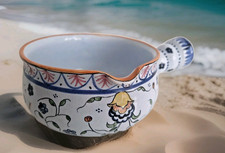 poêlon en céramique vieux