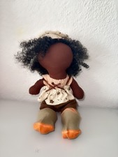 Poupée artisanale en tissu
