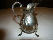 Petit pot à lait style Rocaille, en argent massif, poinçon minerve