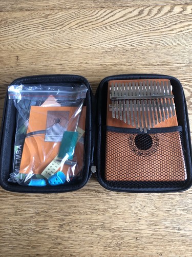 Kalimba with case - with, and