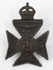 Cap badge : 11th Battalion Finsbury Rifles - BRITISH ARMY (matériel original)