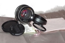 Objectif 50mm f1,8 VOIGT_ULTRON avec bouchon, filtre, pare-soleil et housse TBE