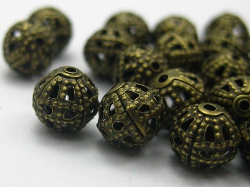 Perles 6mm filigrane bronze - 20,