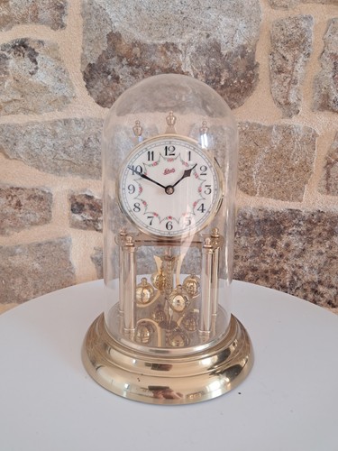 Pendule balancier tournant - à,