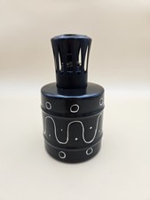 Ancienne lampe Berger Paris France en céramique noire à décor géométrique blanc