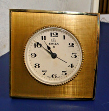 réveil ancien UTI SWIZA 8 mécanique oval sur cadre métal doré vintage 80
