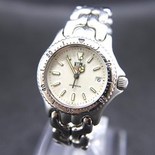 Montre homme Tag Heuer Sel S99013 quartz 34 mm date blanche fabrication suisse