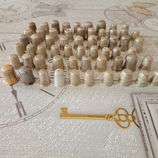 un lot de 59 dés à coudre ( anciens et autres )