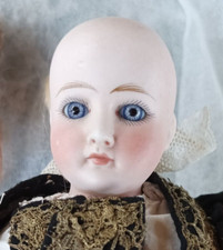 Ravissante poupée tête type Belton bouche fermée yeux à rayons