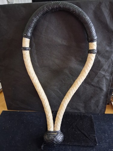 Rawhide bosal part - as, of