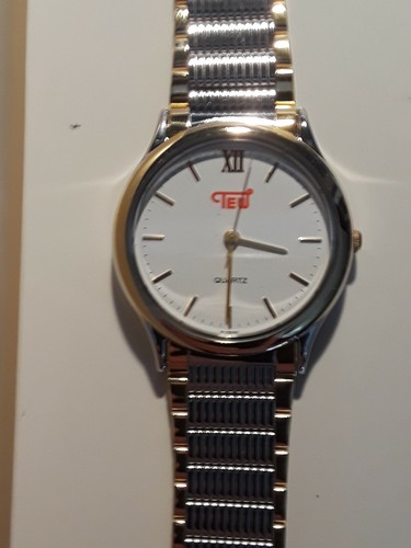 Tew logo quartz - tew, (tokyo