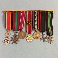 BARRETTE DE 7 REDUCTIONS DE MEDAILLE GUERRE 39 45 POLOGNE RESISTANCE