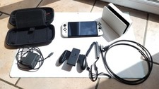Nintendo Switch OLED + étui +