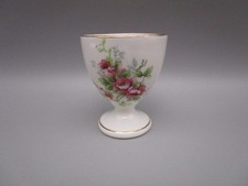 Coquetier ancien en porcelaine