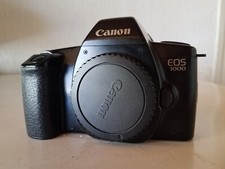 Canon eos 1000 boitier nu en bon etat et fonctionnel avec bouchon