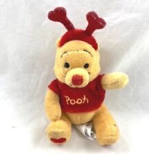 Mini peluche Winnie l'ourson DISNEY STORE St Valentin serre-tête coeur rouge