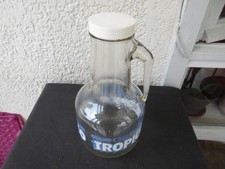 Très belle et grande bouteille en verre avec anse