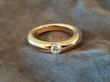 Cartier Superbe alliance jonc en or jaune sertie d'un diamant 0.25ct