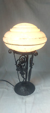 Lampe pied en fer forgé, globe blanc clichy et liseré doré, art déco