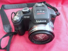 Panasonic Lumix DMC-FZ100 - vitre de l ' objectif cassée -