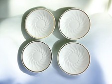Lot 4 soucoupes porcelaine de