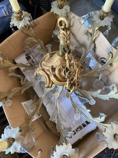 Ancien lustre en bronze 10 feux de style Louis XV . tres bon état. 