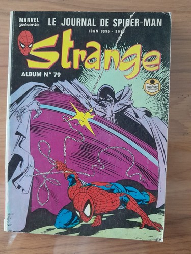 Album strange n 79 - ,