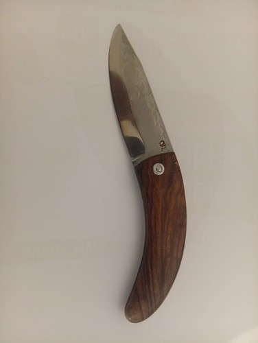 Couteau pliant deux clous