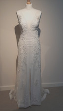Robe de mariée créateur Watters of London en dentelle blanche taille 40 jamais portée