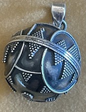 Pendentif bola de grossesse en