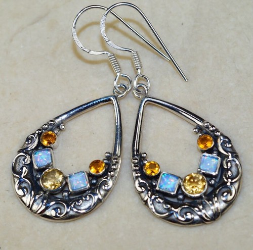 Belles boucles oreilles - d'oreilles, en