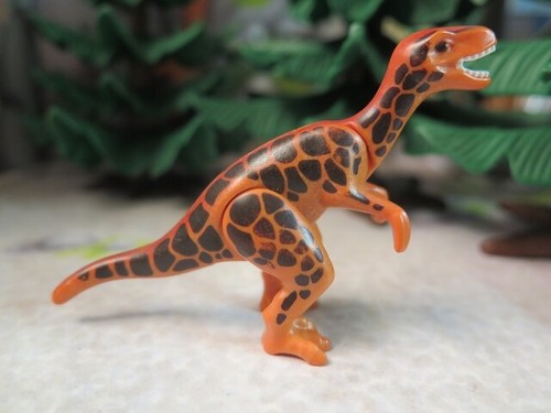 Vélociraptor orange dinosaure