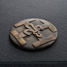 Applique circulaire fleur de lys sur croix templière bronze scouts de France