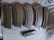 airsoft lot de chargeurs divers et un silencieux  pour réplique