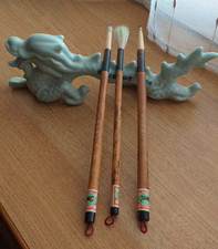 Dragon repose pinceau