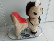 ANCIEN CHEVAL A BASCULE/ ROULETTE A DOSSIER RECOUVERT  PELUCHE DEHOUSSABLE