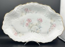 Plat ovale en porcelaine de Limoges décor floral et bord doré