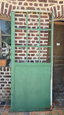 ancienne porte  En Fer vitrée