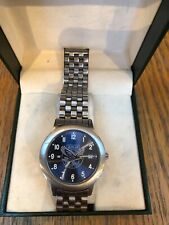 MONTRE AIGLE avec sa boîte d'origine, Bracelet en métal.