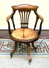  fauteuil tournant style regency  agrémenté de marqueterie . XX siècle .