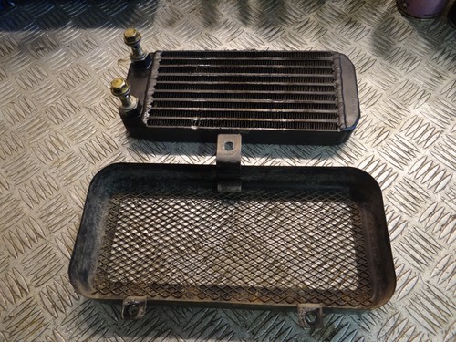 Radiateur huile grille de - et,