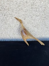 Oiseau stylisé en corne