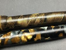 # 2 ancien stylos plumes à pompe gold starry